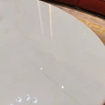 Two-Tone Oval Coffee Table with White Marble Top, High-Gloss Panels and Metal Base